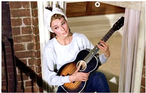 Audrey cantando Moonriver en Desayuno con Diamantes, con m�sica de Henry Mancini